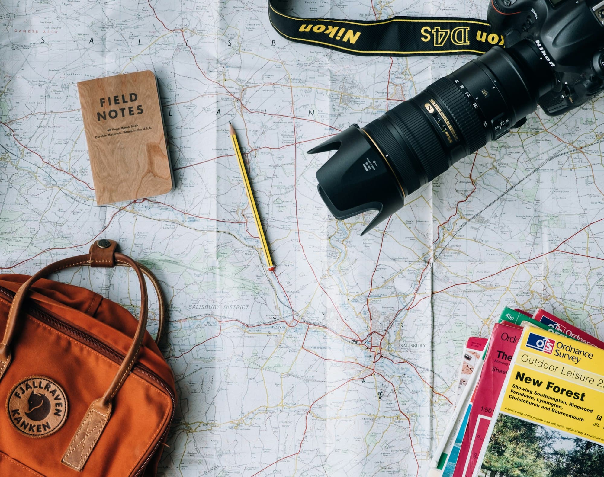 Quiet planning desk with a guidebook.