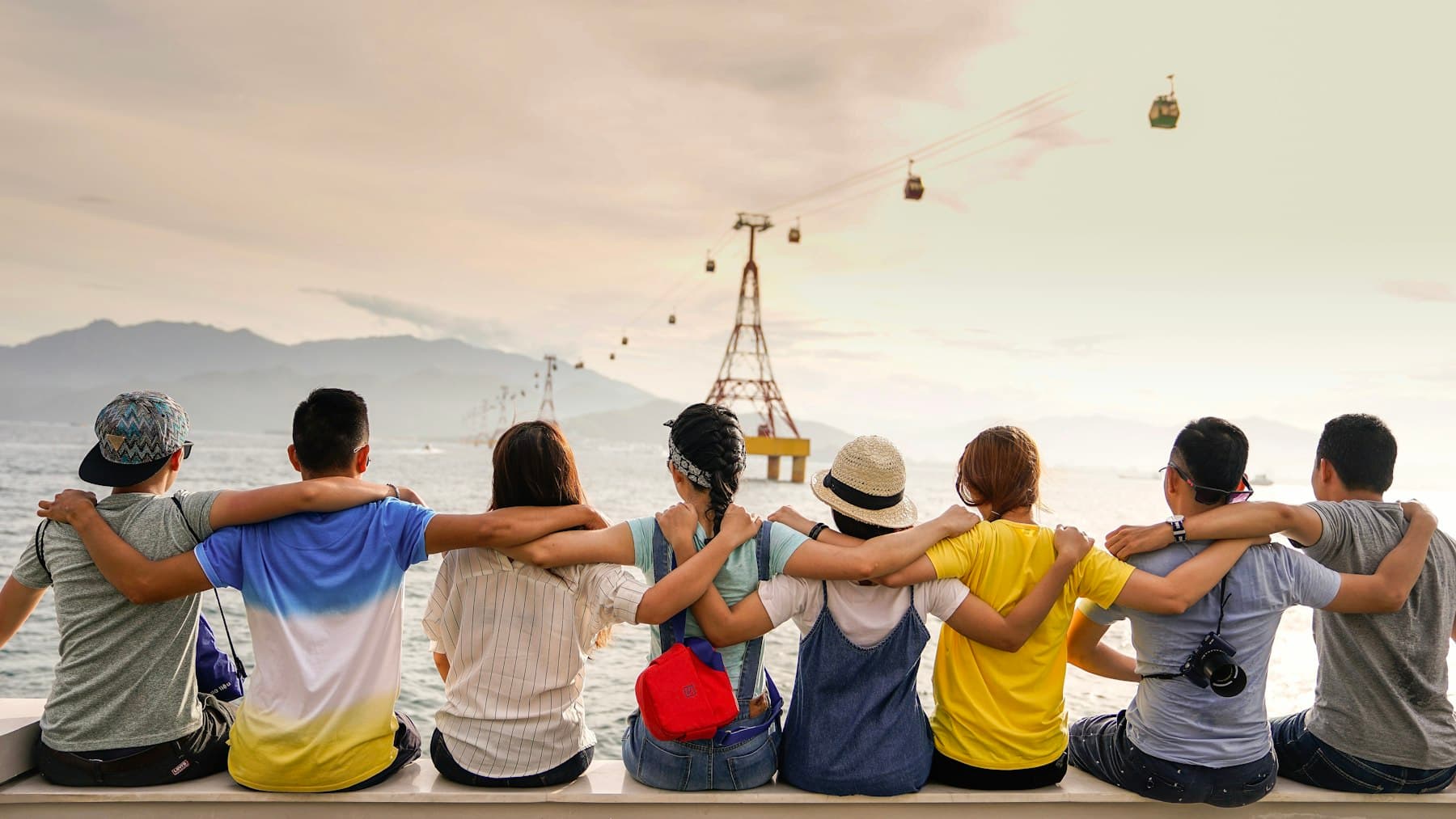 Harbour promenade with older travellers.